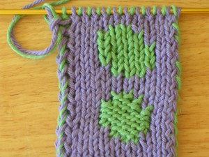 Double knit test swatch: Stockinette stitch verses Reverse Stockinette stitch. Both are made from the same chart