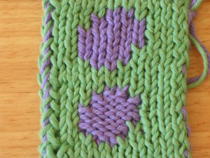 Double knit test swatch: Stockinette stitch verses Reverse Stockinette stitch. Both are made from the same chart